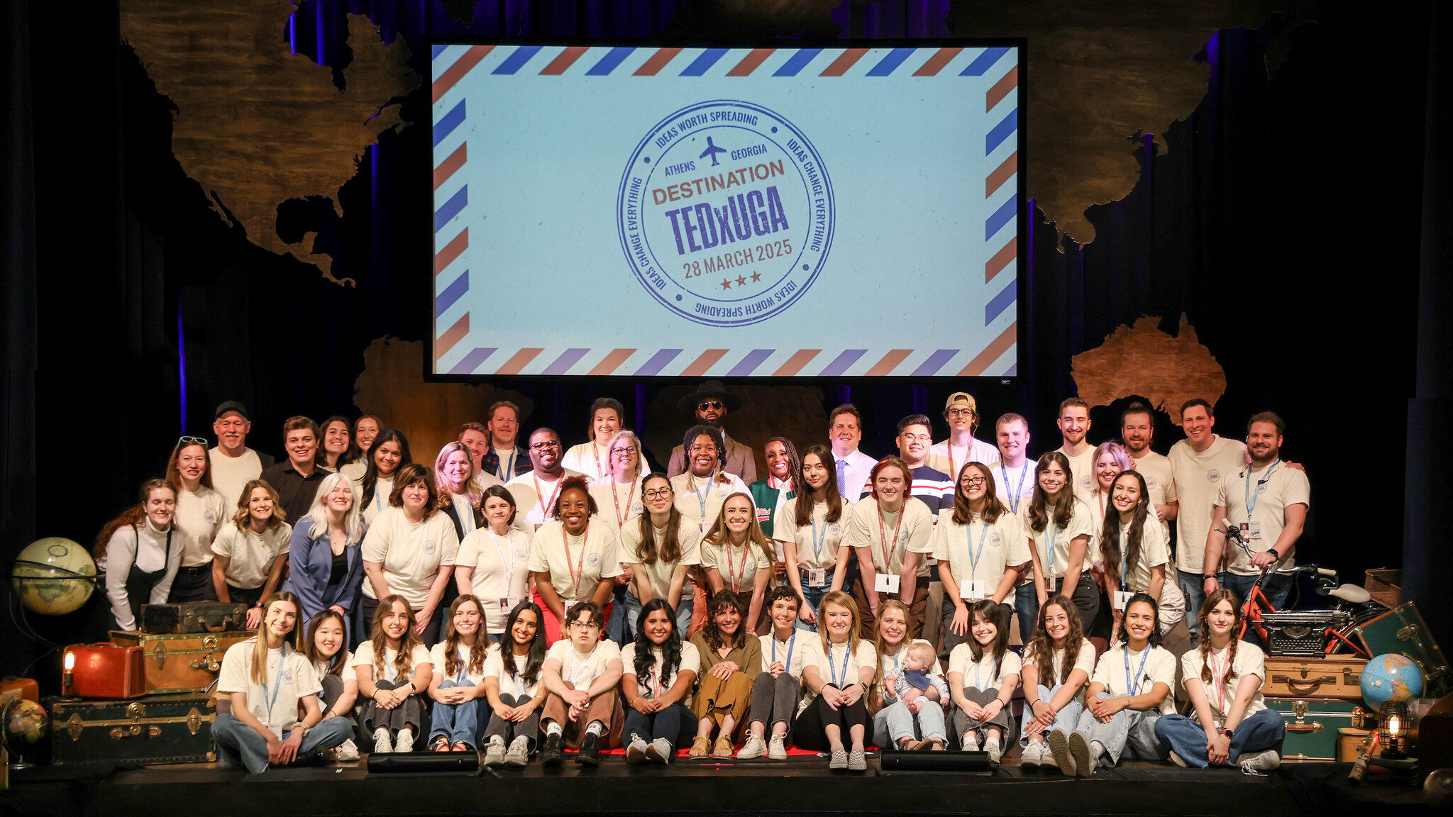 Photo of the full TEDxUGA team on stage for Destination: TEDxUGA 2025.