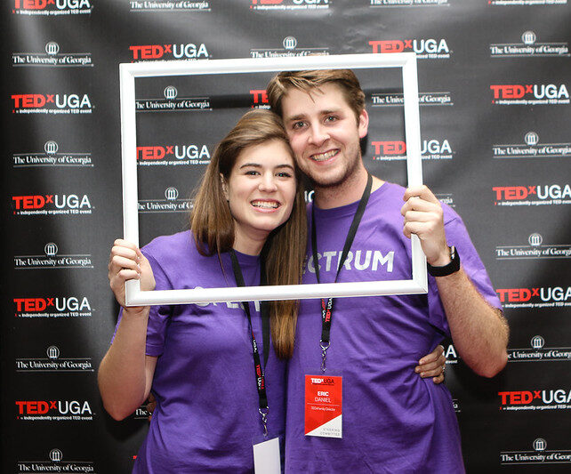 2017 spectrum emily and eric pose at photobooth