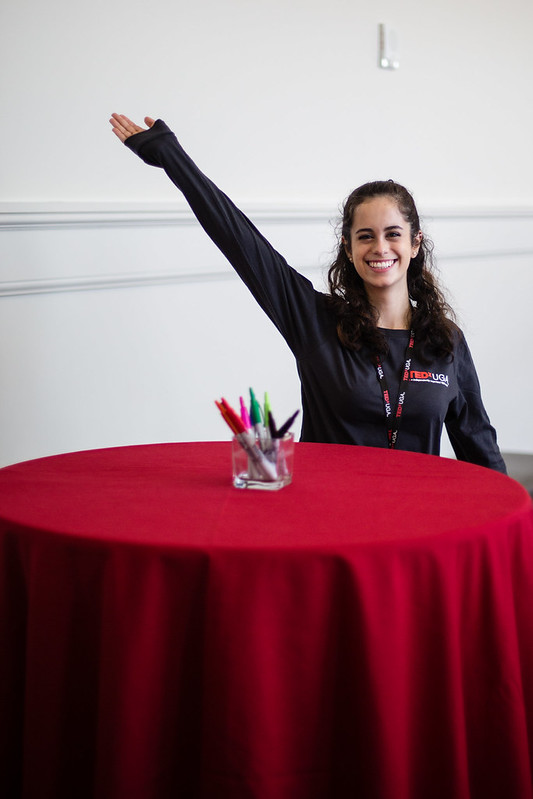 TED 2016 illuminate student posing with table